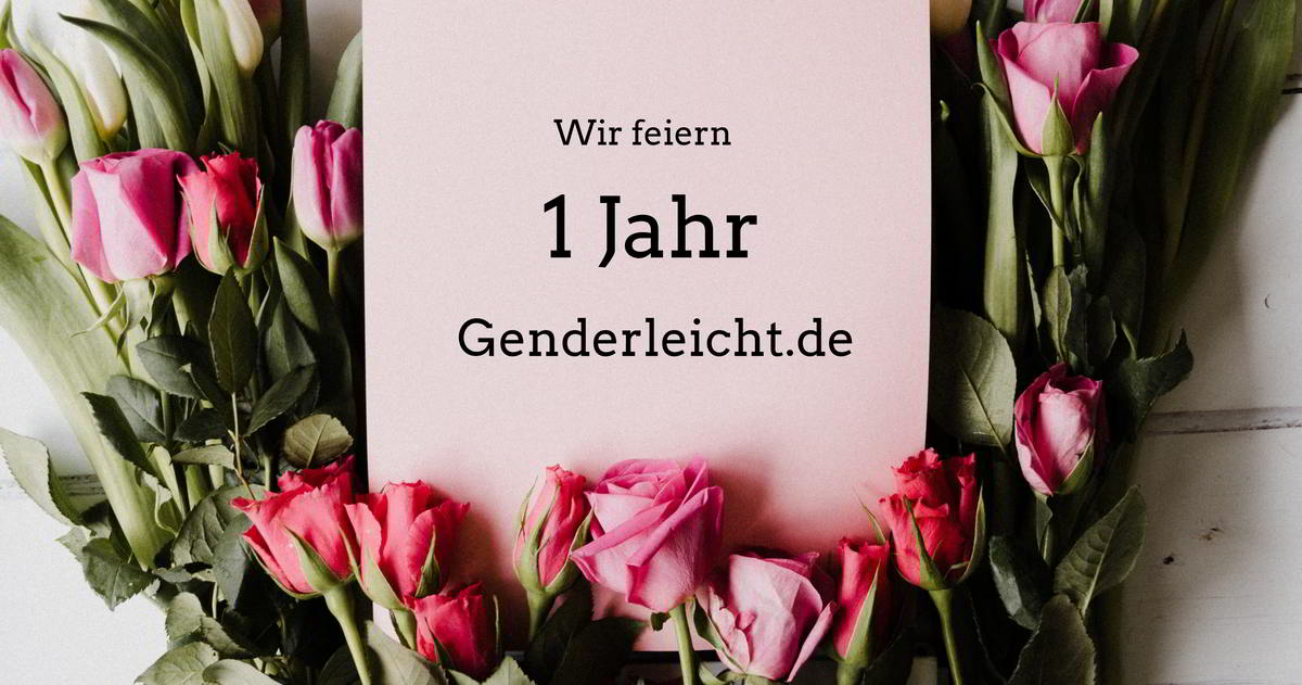 Text "Wir feiern 1 Jahr Genderleicht.de" umgeben von liegenden rosaroten Rosen