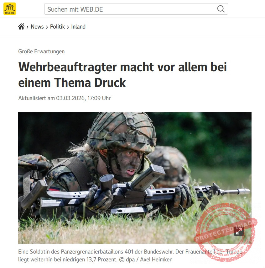 Screenshot Web.de_2026-03-03 Soldatin liegt bei Kampfübung mit Gewehr im Gras